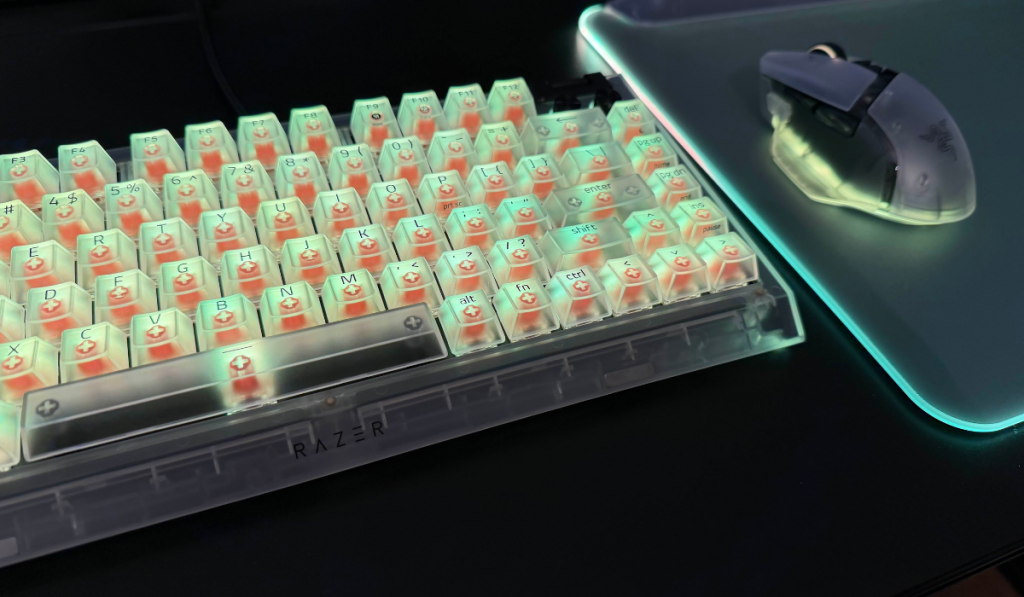 image showing the razer blackwidow v4 75 next to other items in the phantom white range