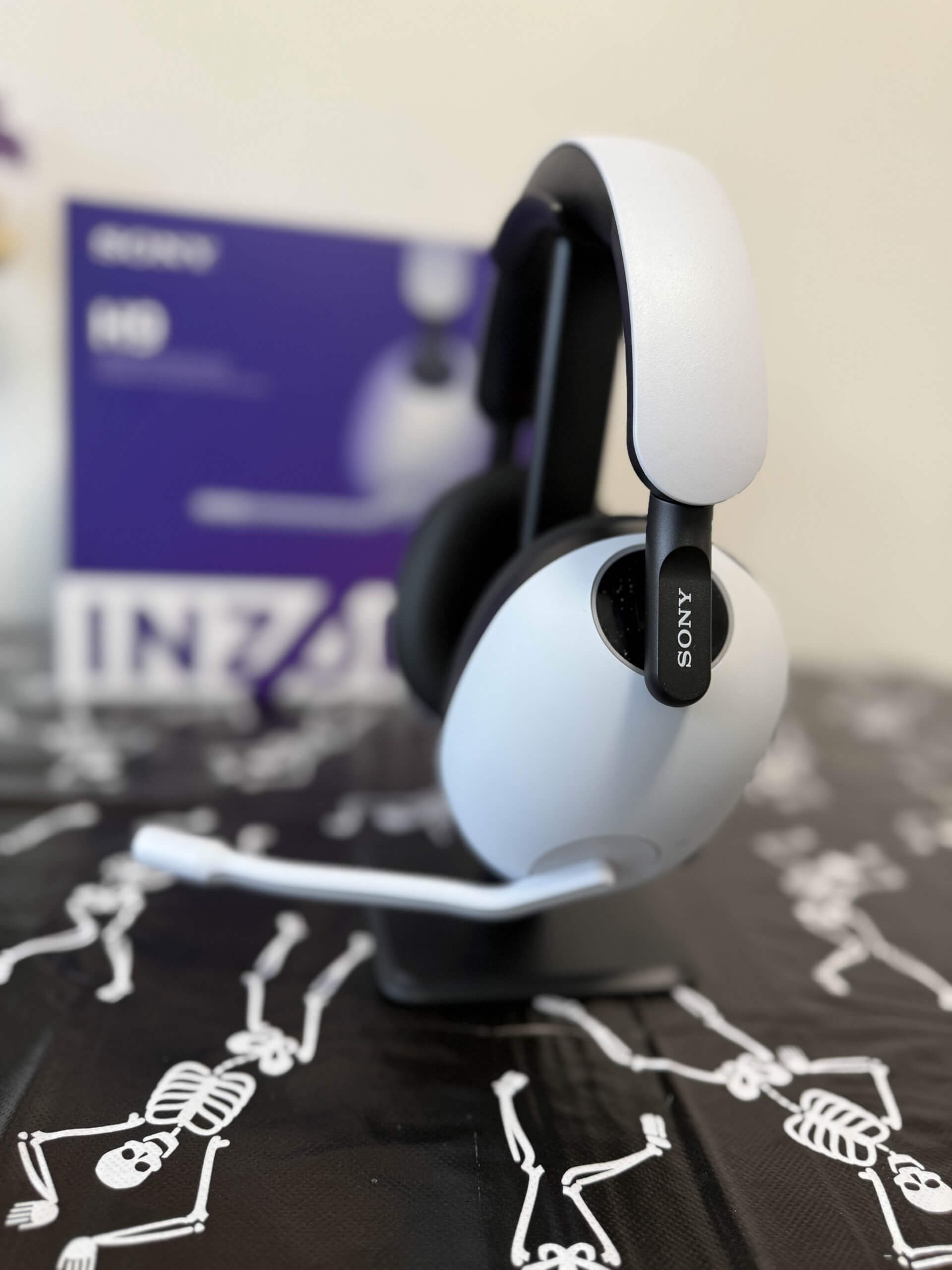 image of the inzone h9 on a stand on top of a table