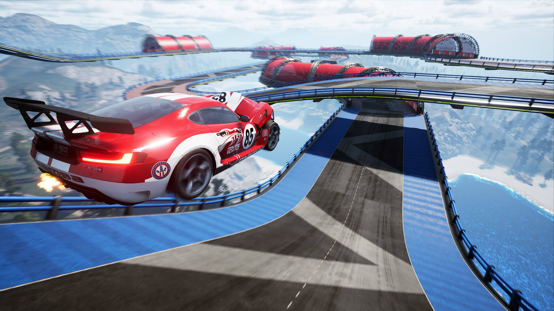 A red muscle car with it's bonnet crumpled takes to the air as it leaps over a jump.