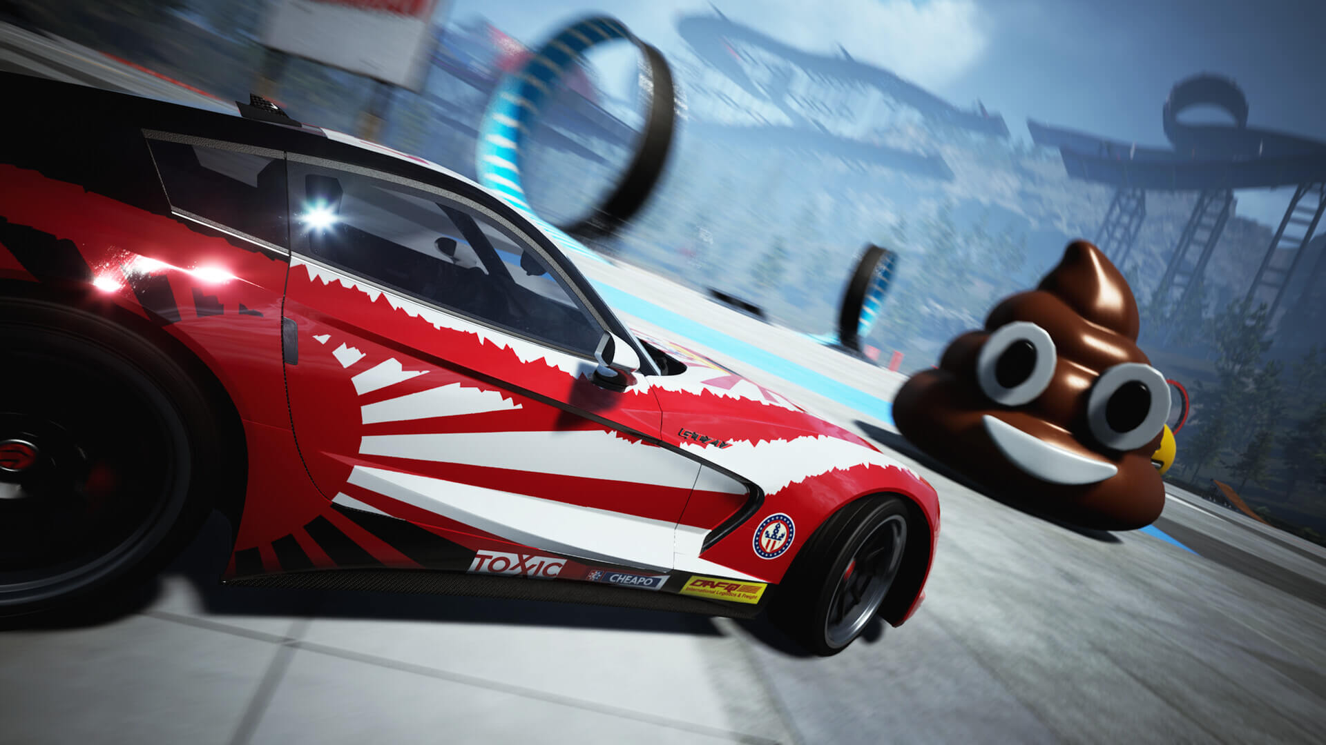 A red sports car drifts close to a giant poop emoji statue.