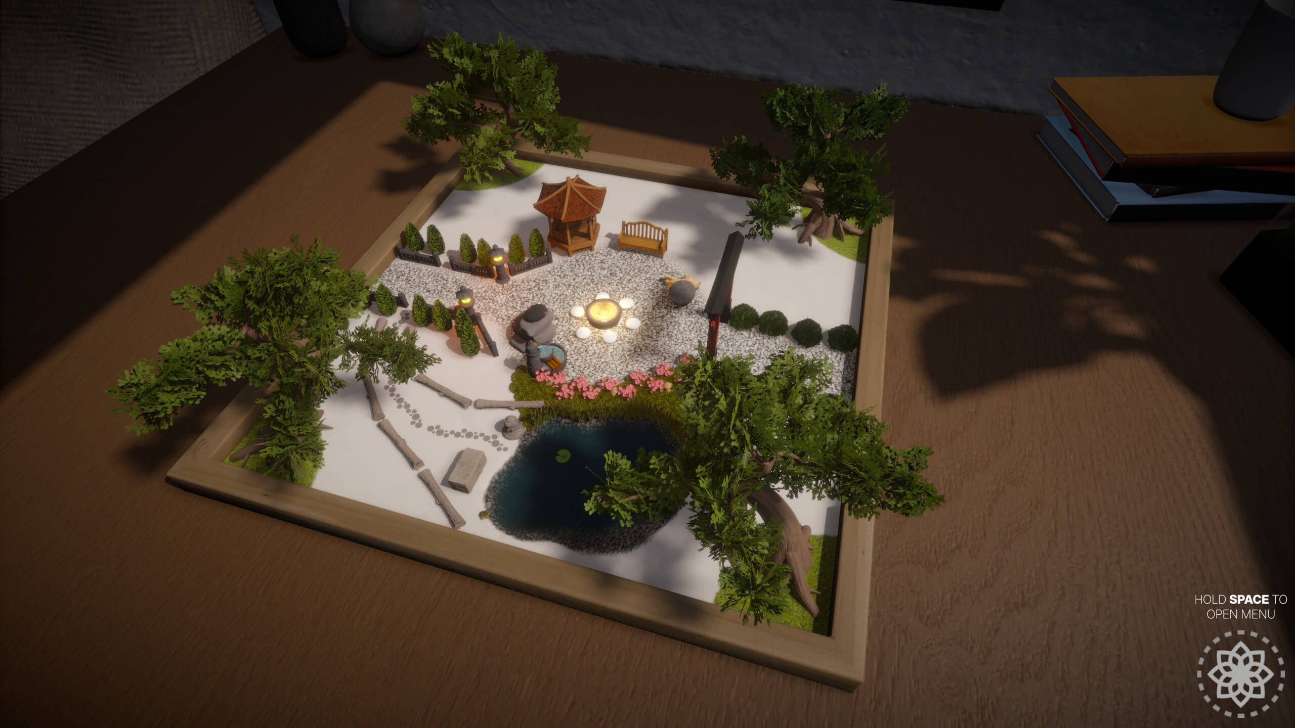 A miniature garden scene featuring a pond, a stone path, trees, a gazebo, benches, and characters near a glowing campfire.