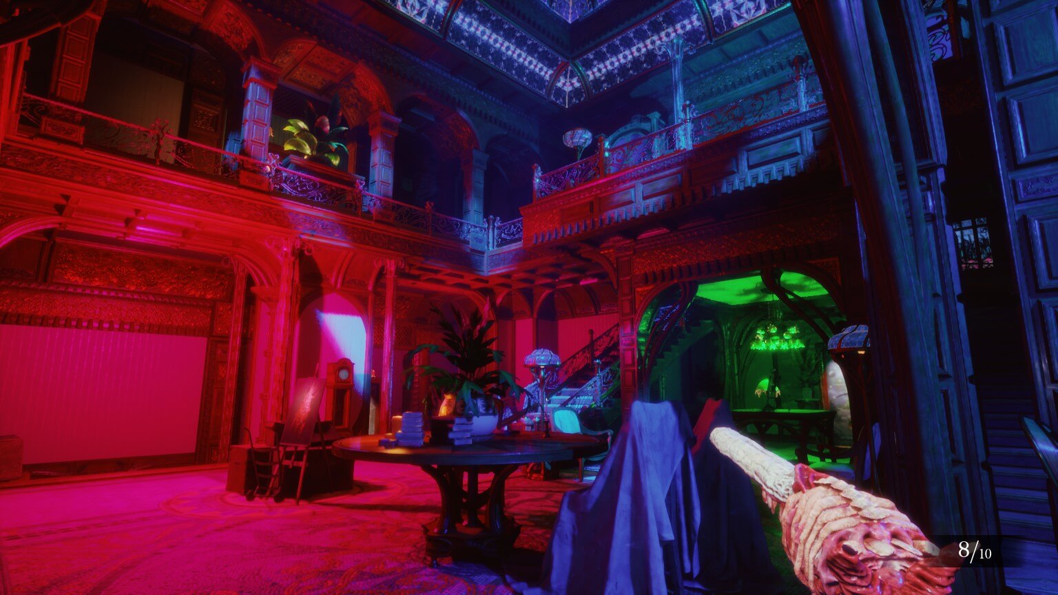 A large room with a couple of tables, the lighting splits between a red and blue hue. The player is holding a gun that seems to made out of flesh and bone.