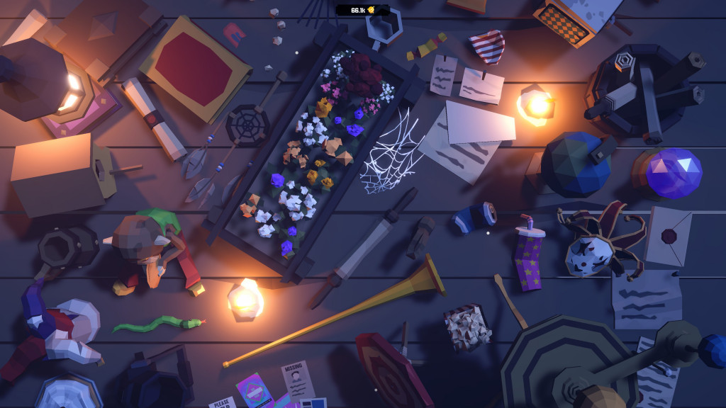 Overhead view of a cluttered table filled with assorted objects including lanterns, flowers, scrolls, toys, and a snake.