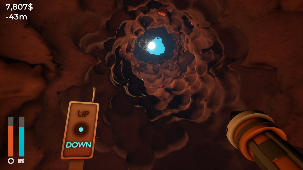 The player stares up at the sky from the bottom of a deep, dark hole.