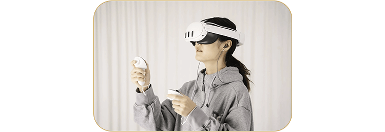 Image of a person wearing a VR headset while using the VR500 earphones