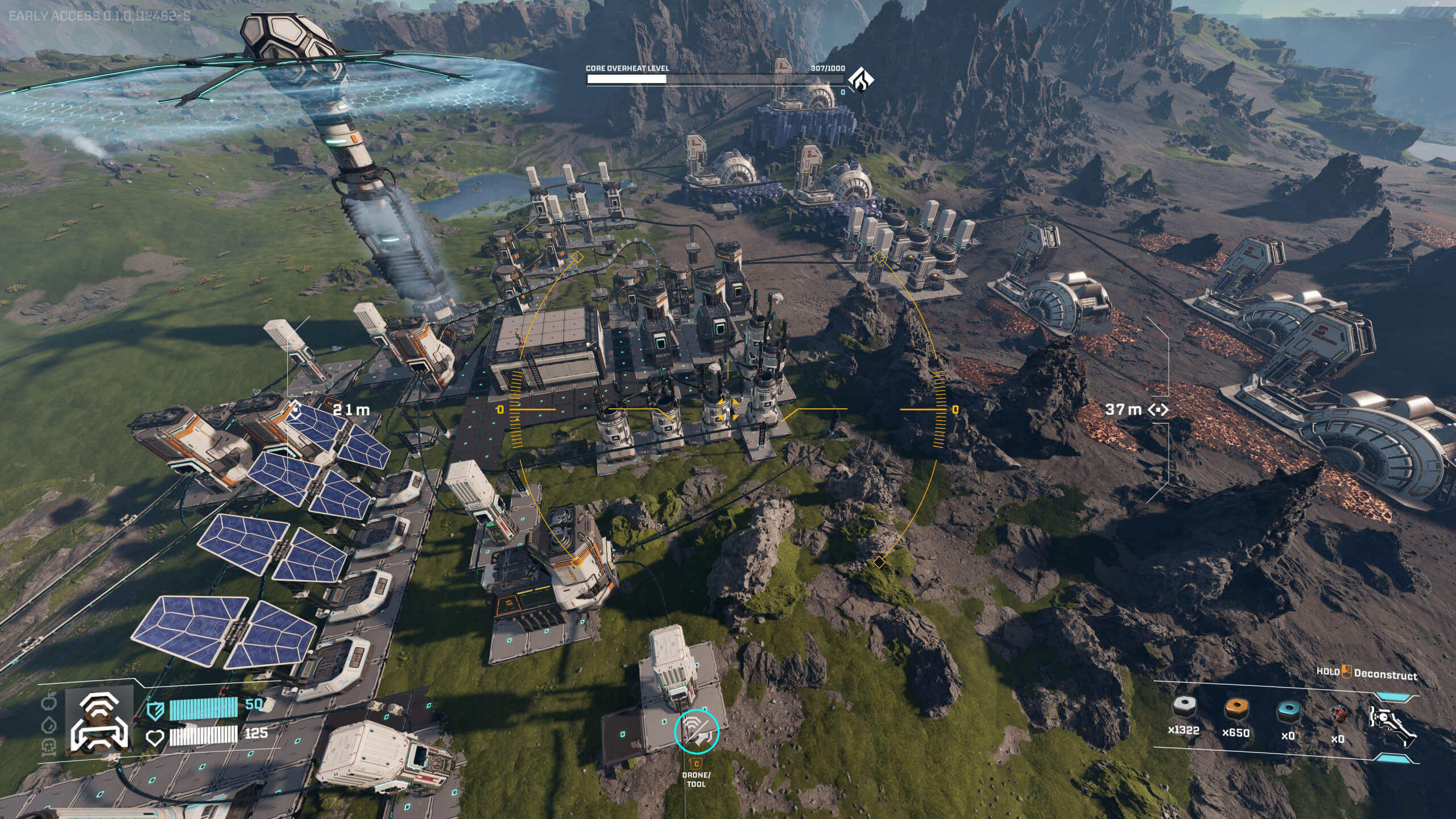Screenshot from StarRupture. Aerial view of a futuristic industrial facility with solar panels, machinery, and a hovering structure in a rocky landscape.
