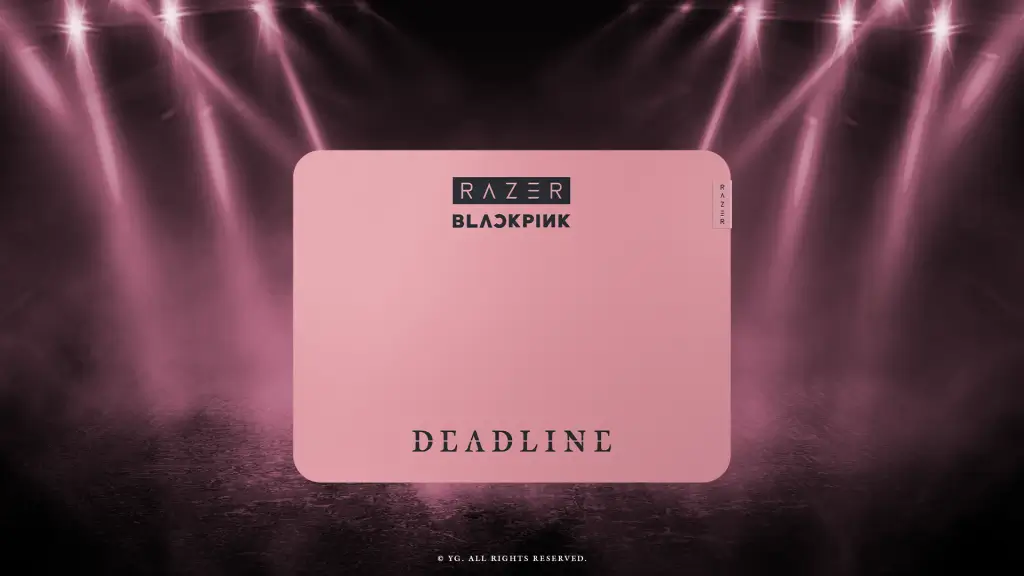 Stock image of the Razer Gigantus V2 – Medium – BLACKPINK Edition. Pink gaming mousepad with Razer and BLACKPINK logos, "DEADLINE" text, set against a dark background with purple stage lights.