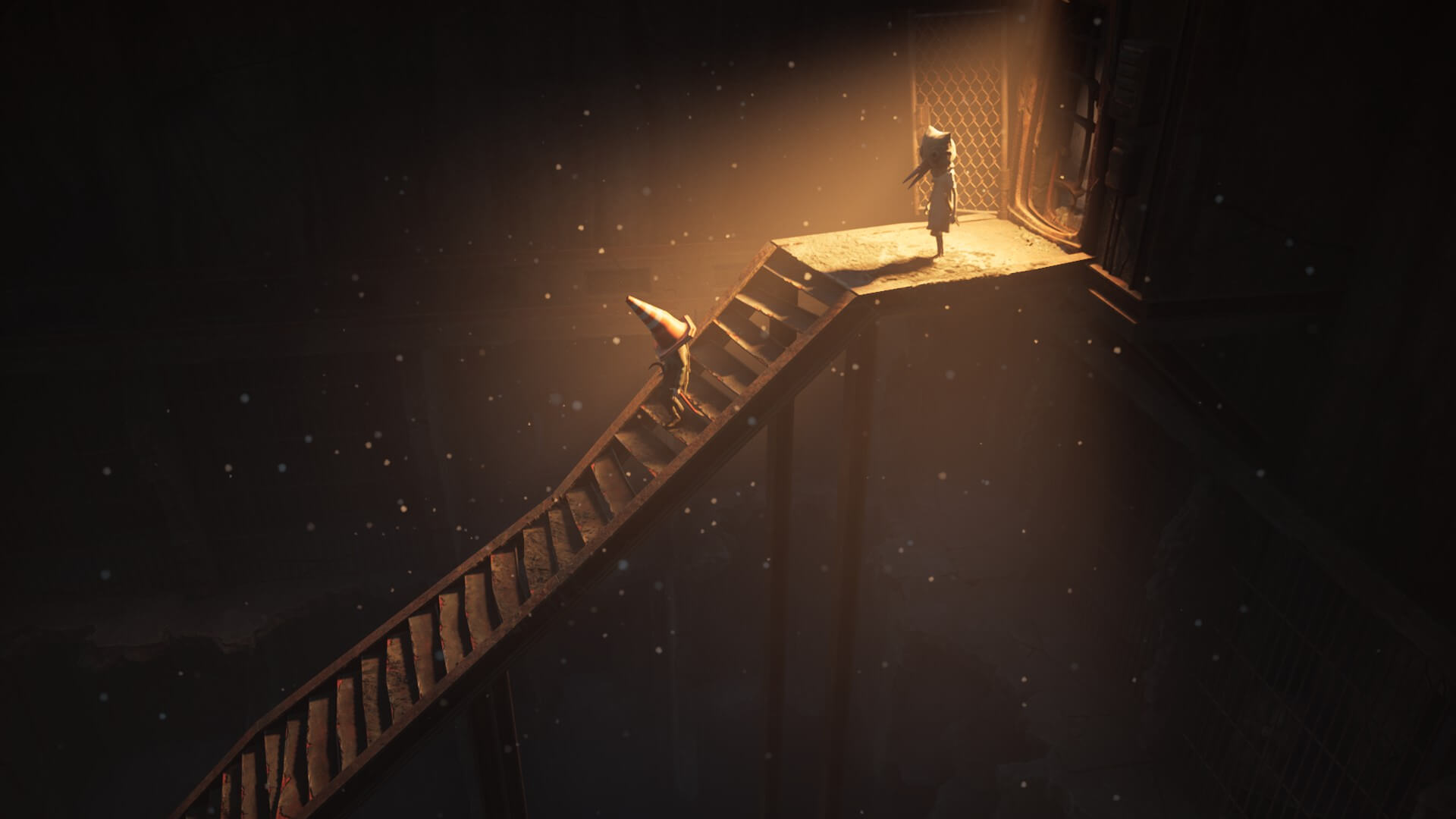 A child with a traffic cone on his head is walking down some raggedy stairs. Another child stands atop wearing a mask that resembles a bird. A light is used to emphasises the child on the right. 