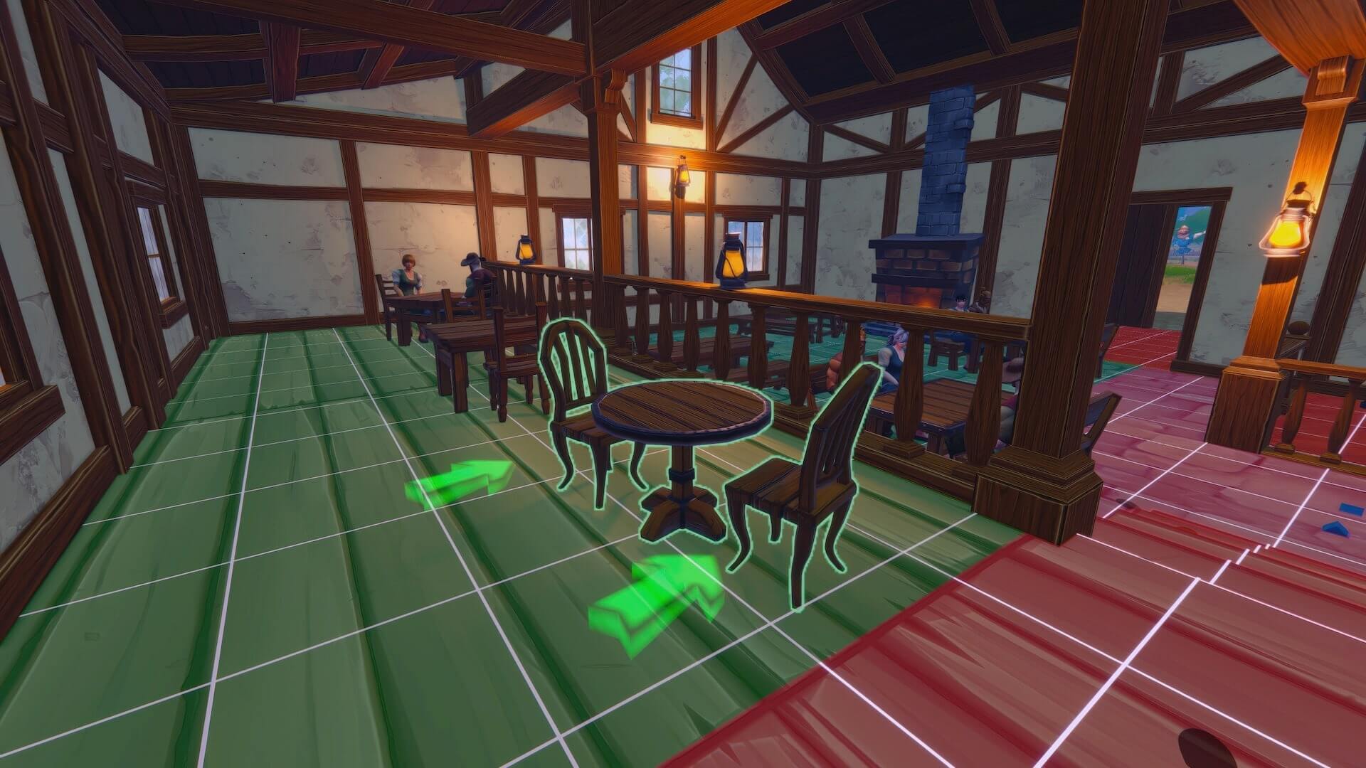 The player is placing a small table and two chairs in their tavern.