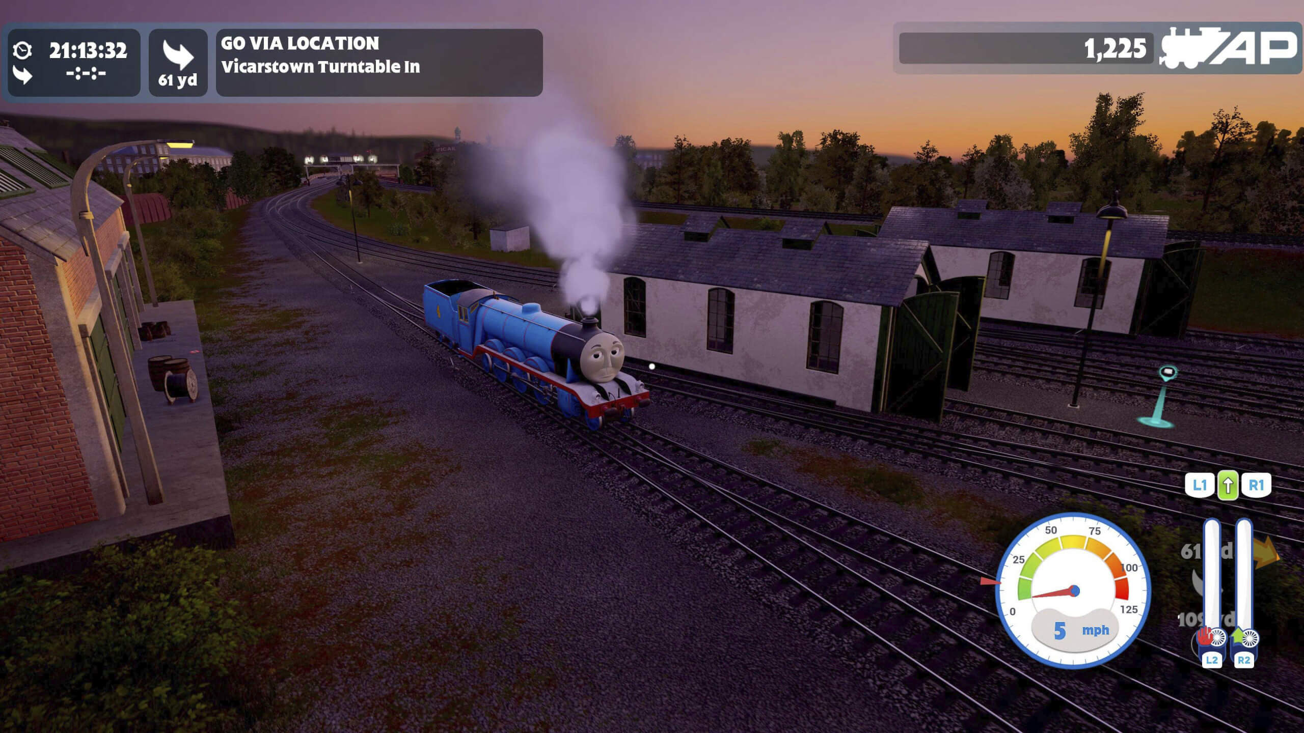 Gordon, a large cartoonish blue train engine puffs past a shed on at sunset in a rail yard. Steam rises from the funnel conveying a sense of movement and adventure.