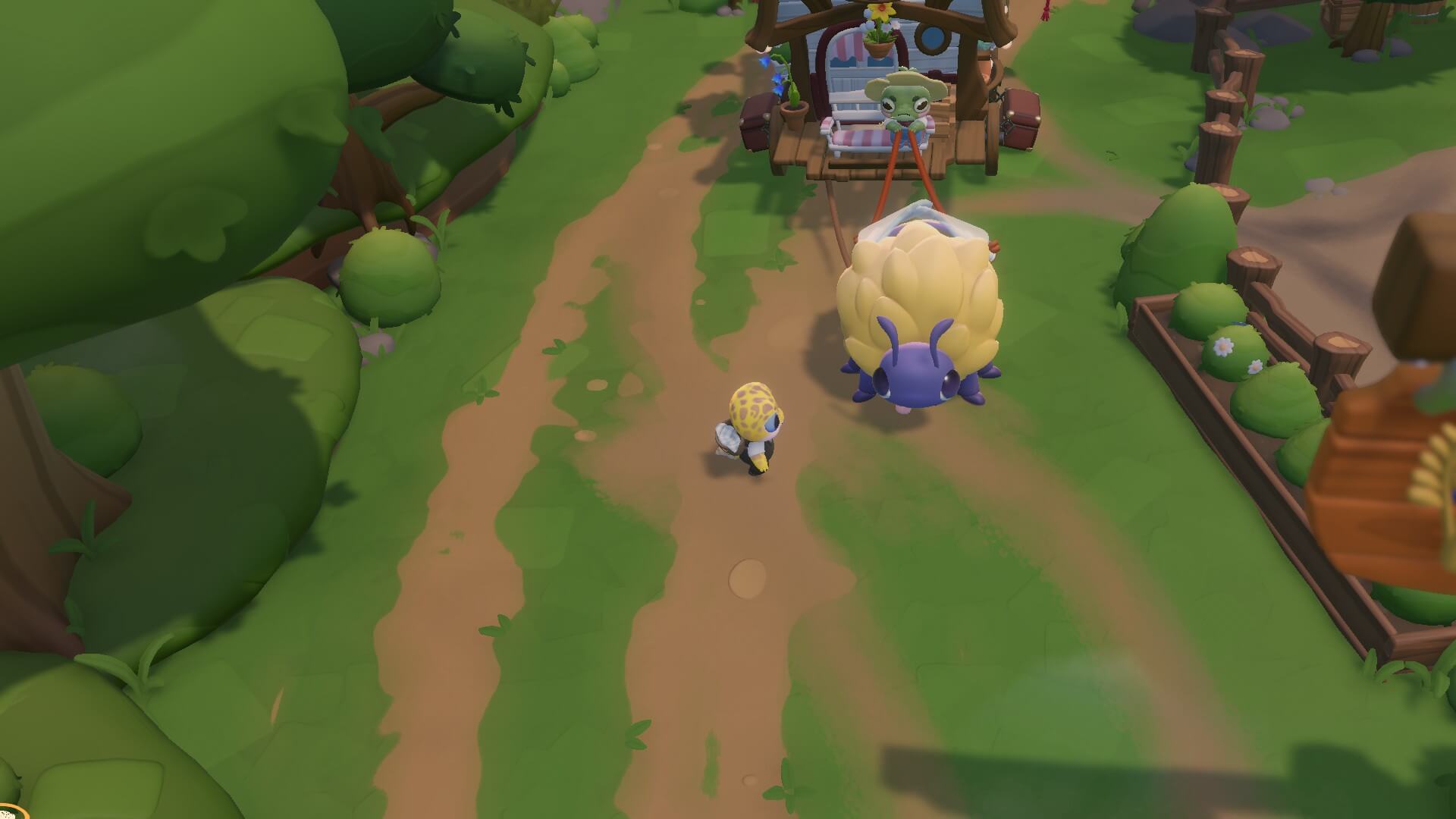 A gecko character is stood in a road with a large bumblebee, although it's stripes aren't shown. The bee is pulling a large caravan that look like a house behind it. 