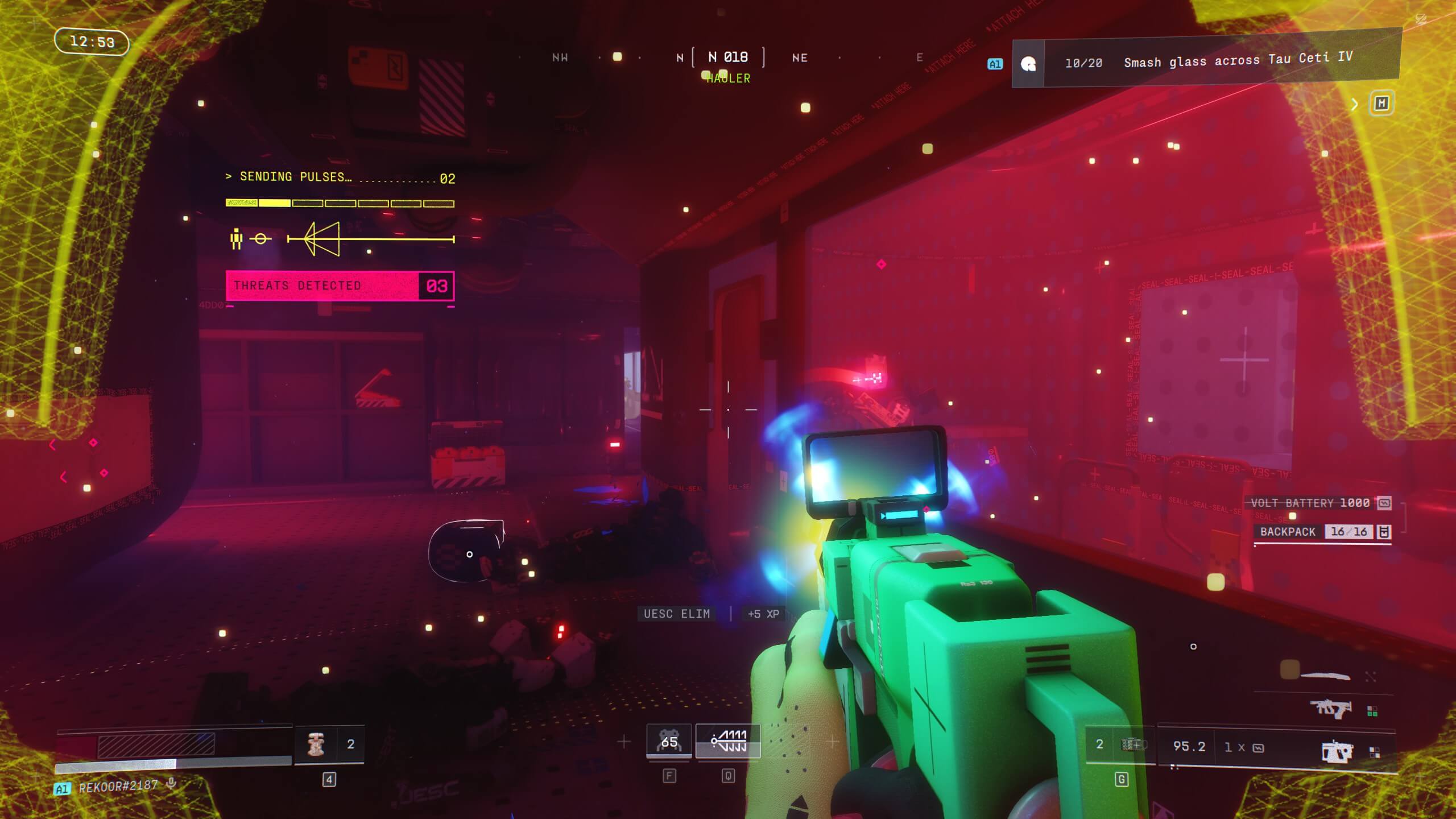 First-person shooter game view inside a futuristic red-lit corridor with a green weapon aimed and three threats detected.