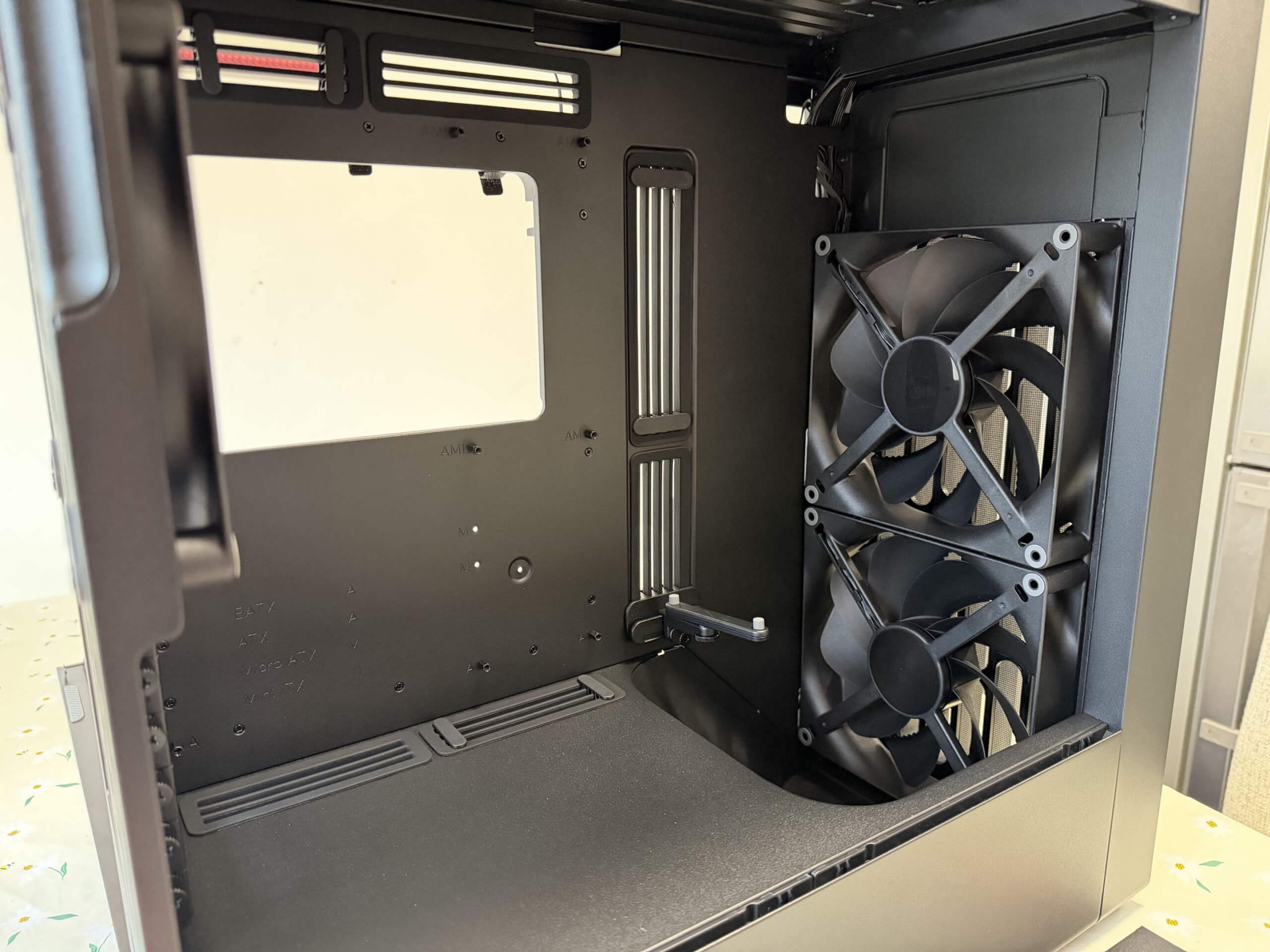 image of the bf 360 flow case with the side panel open so you can see the ramp and front fans