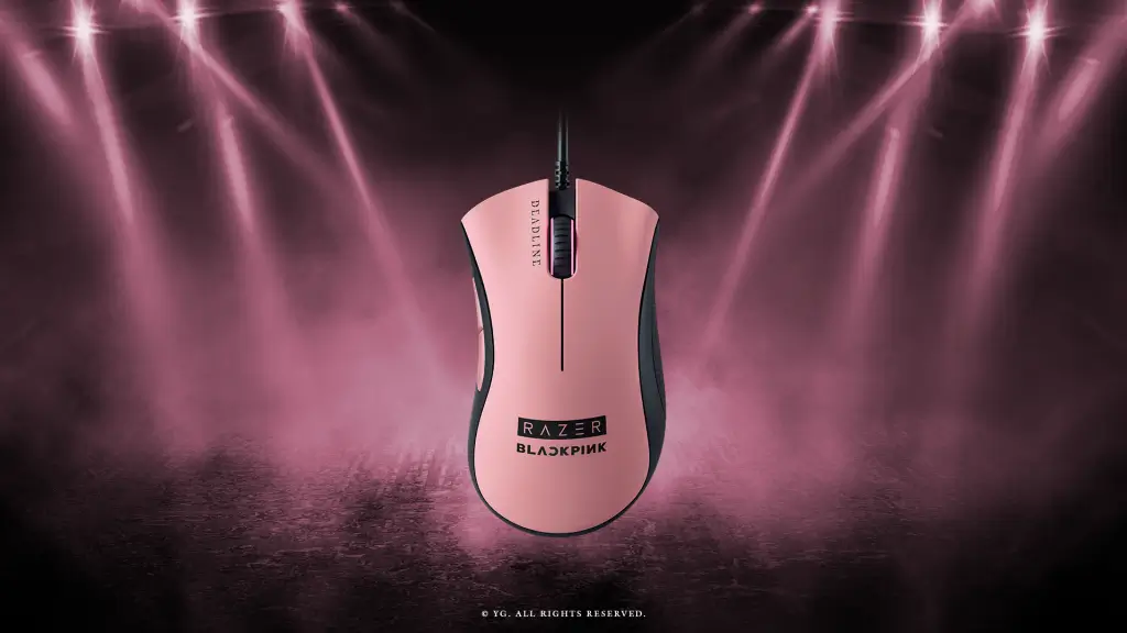 Stock image of the Razer DeathAdder Essential – BLACKPINK Edition. Pink and black Razer gaming mouse with "BLACKPINK" branding, spotlighted on a dark pink smoky background.