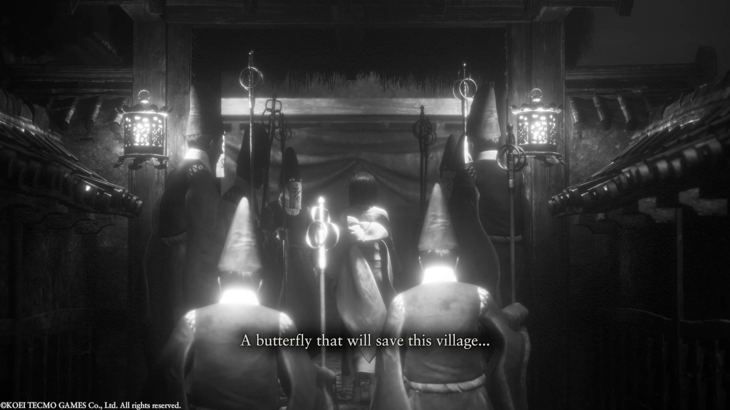 A black and white shot, of a gathering of priests escorting a young girl to a shrine. Below is text that says "A butterfly that will save this village".