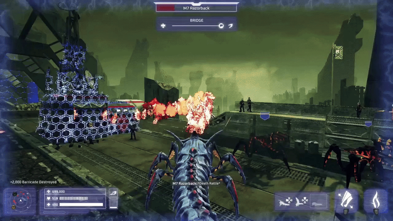 A bug attacking an outpost with its fire breathing and mandibles. It runs from one building to another. 