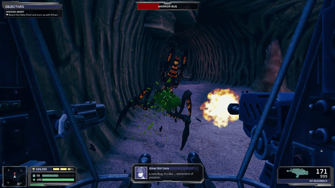 A GIF of the player piloting a mech. In it, they gun down a few enemy bugs, before switching to the chainsaw arm. 