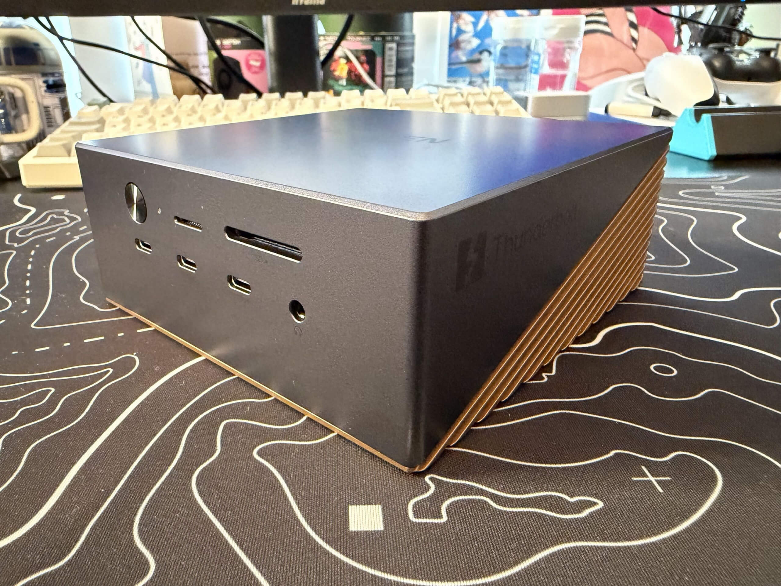 the ugreen maxidok unit sat on a desk in front of a keyboard