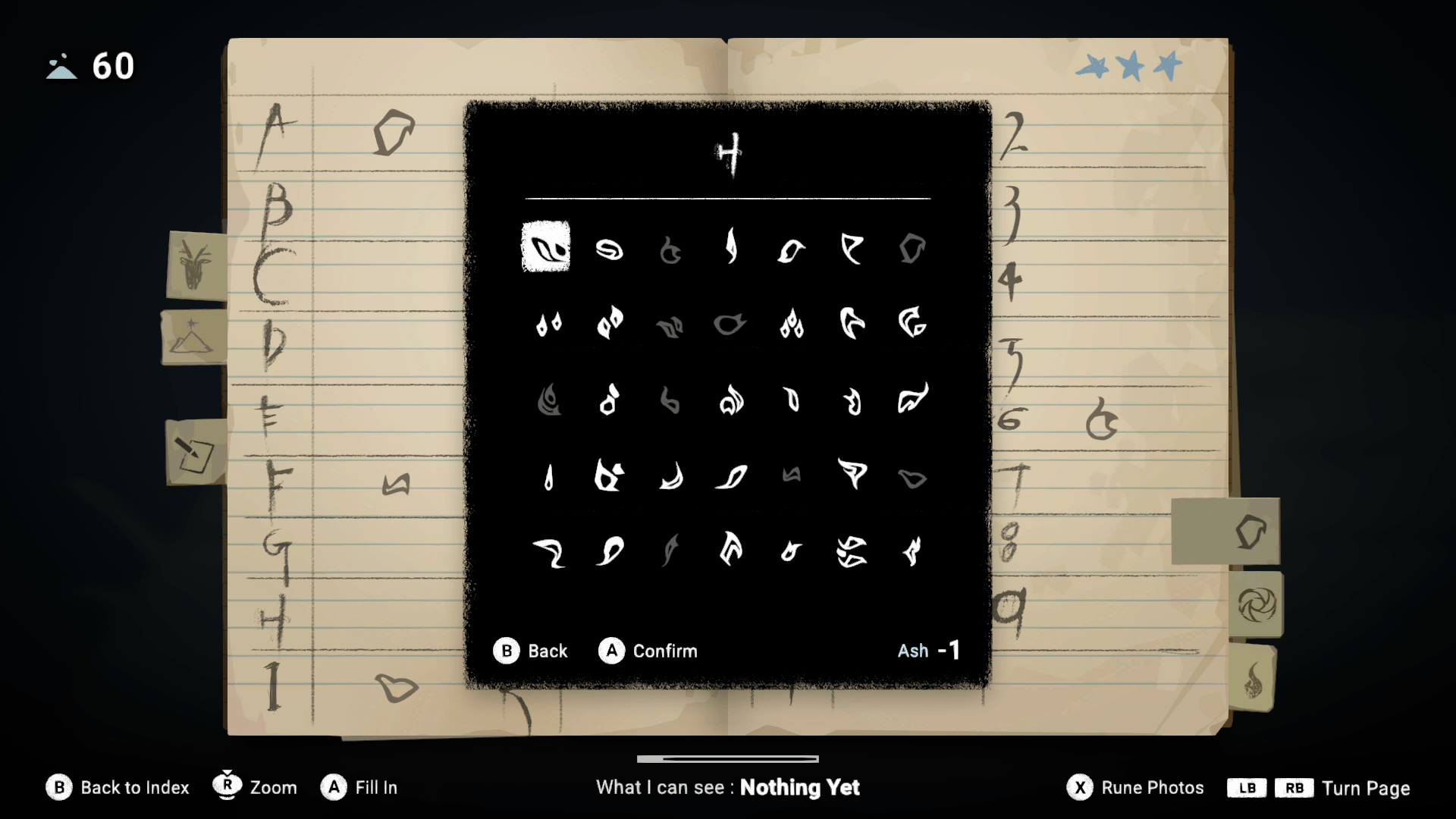 A black box with various symbols, behind it is a book with the alphabet. 