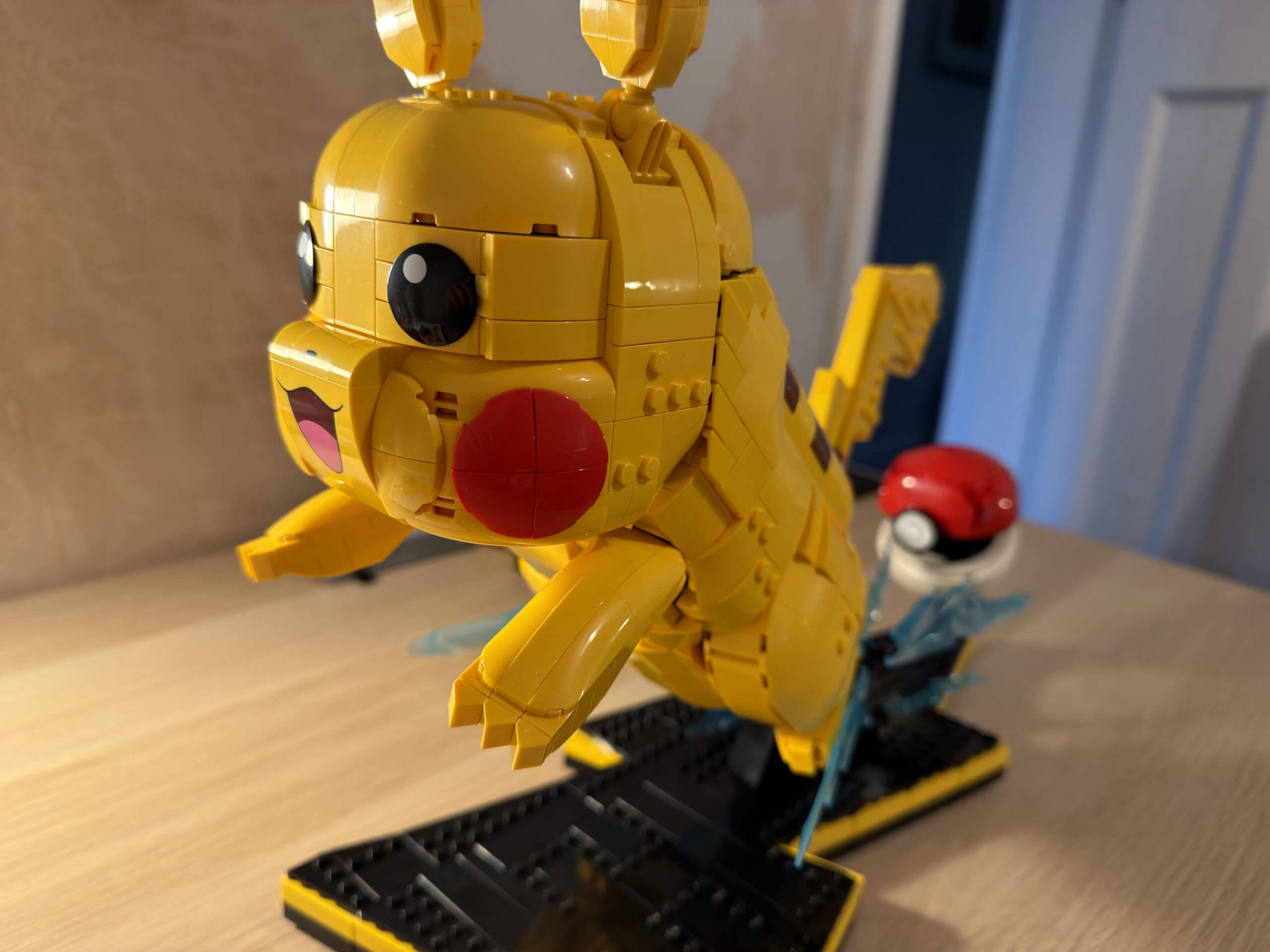 image of the lego pikachu set built on a desk
