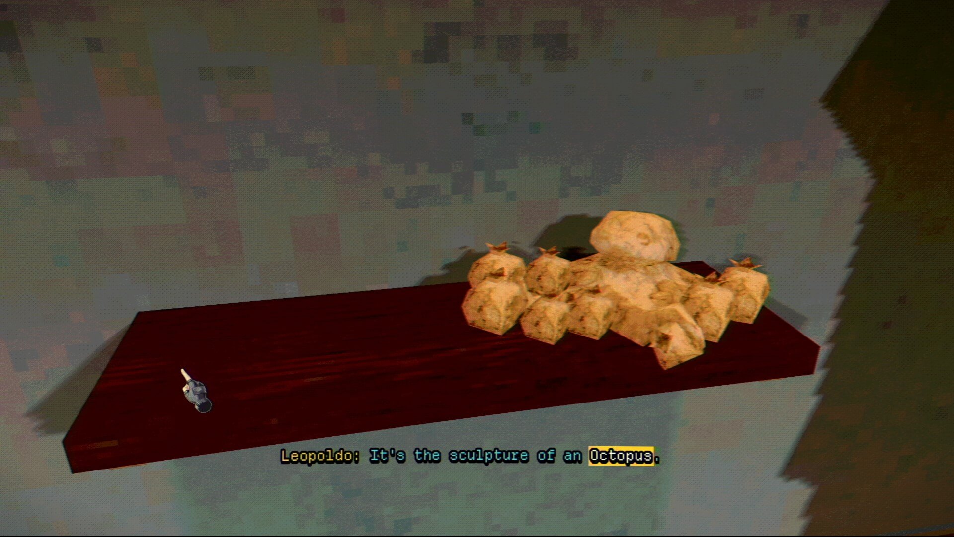 A shelf with a statue. Although it is really hard to make out, the statue is meant to be an octopus with fruit. 