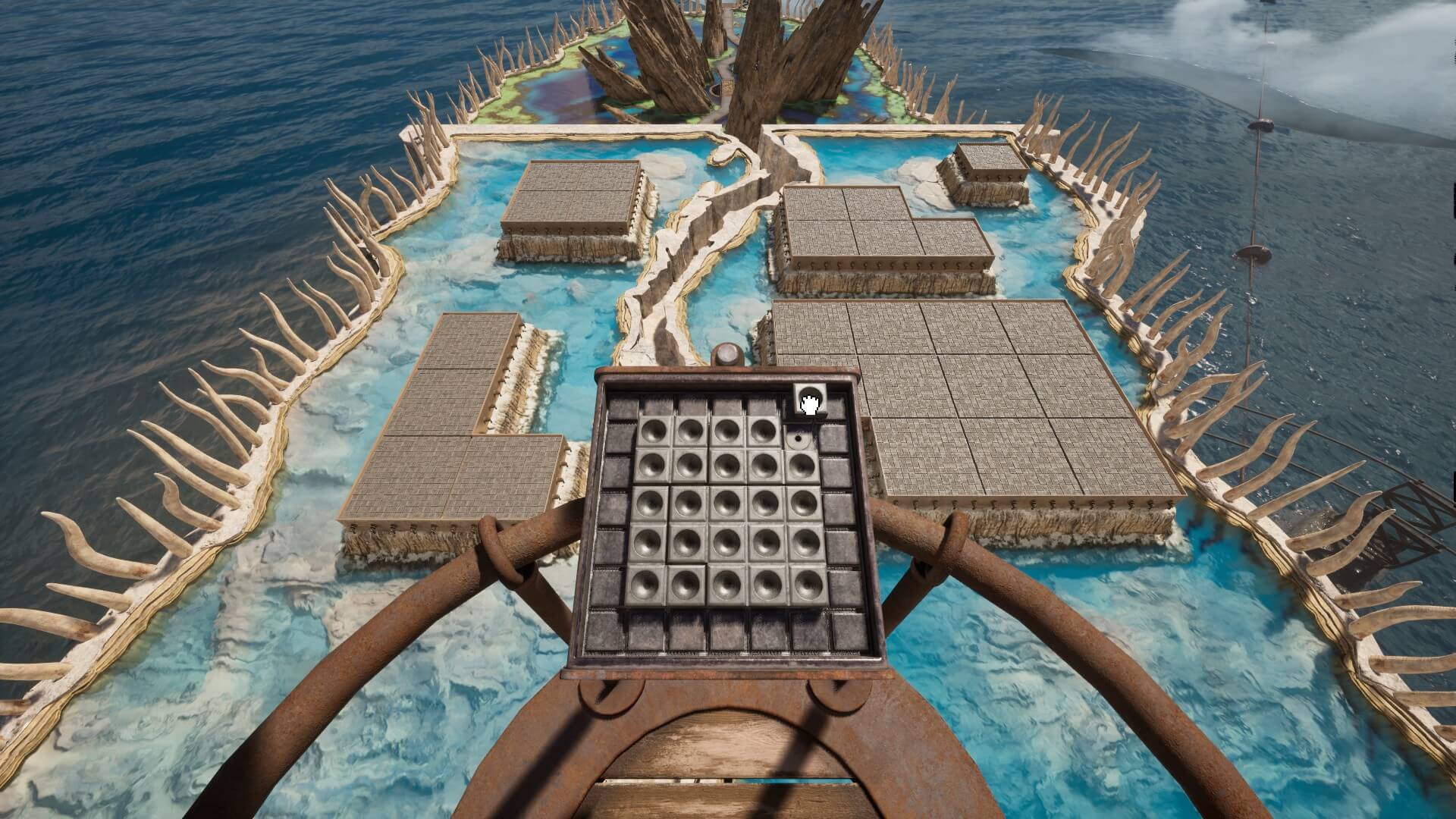A small grid with little indentations is in front of the player. Behind are grey shapes in different sizes in a rock pool which is blue. 