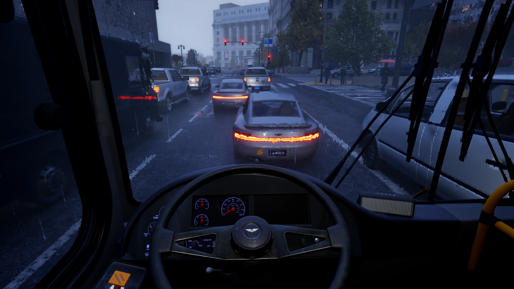The first-person camera from the drivers perspective. It's a rainy, overcast day, with rain blanketing the front windscreen. The bus is currently idle in a traffic jam.