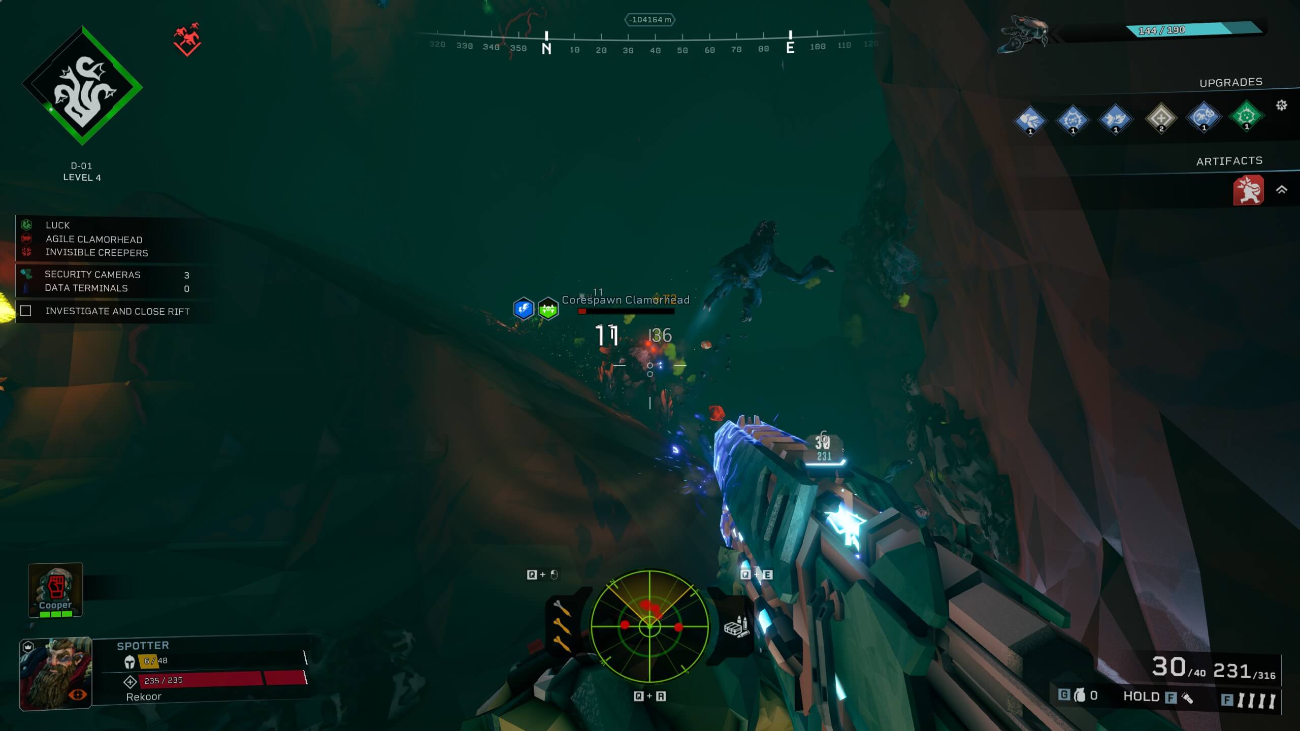 First-person view of a player shooting glowing blue ammo at hostile creatures in a dark cave, with HUD showing health, radar, and upgrades.