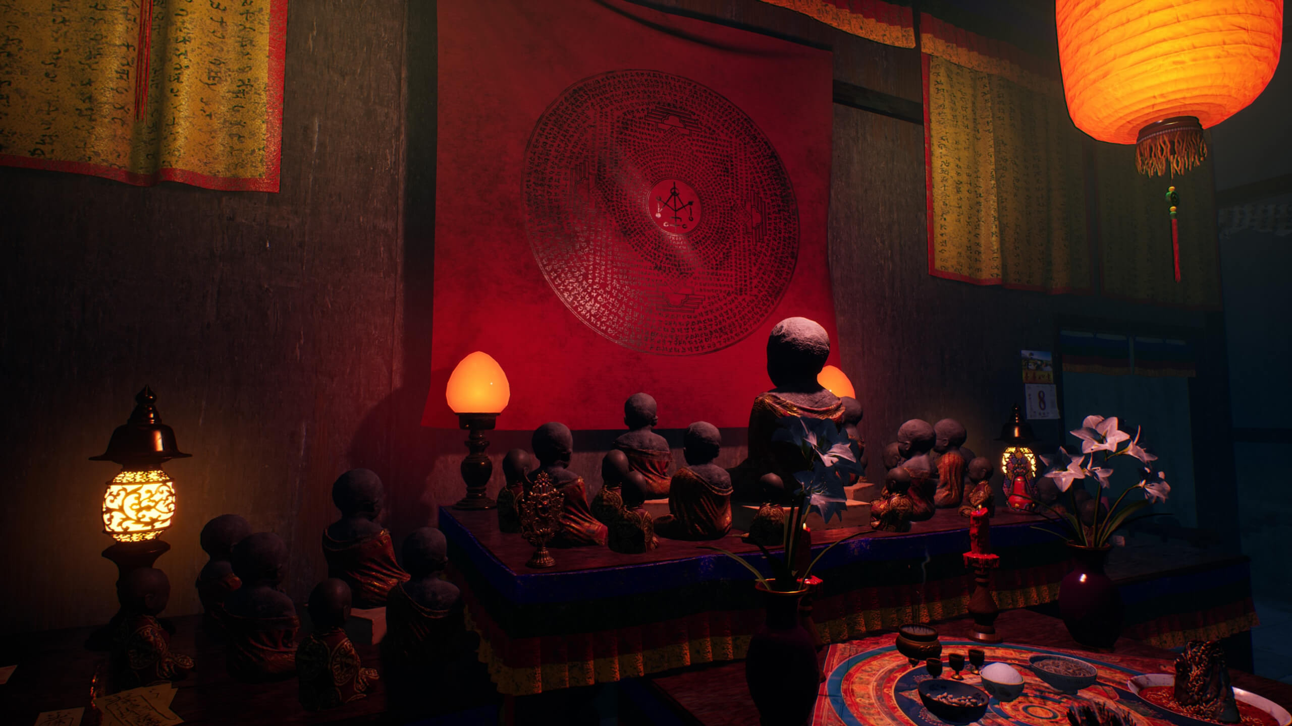 A shrine with multiple statues facing a wall, the wall itself has a large cloth with a Taiwanese symbol on it. In front of the shrine is a smaller table with offerings.