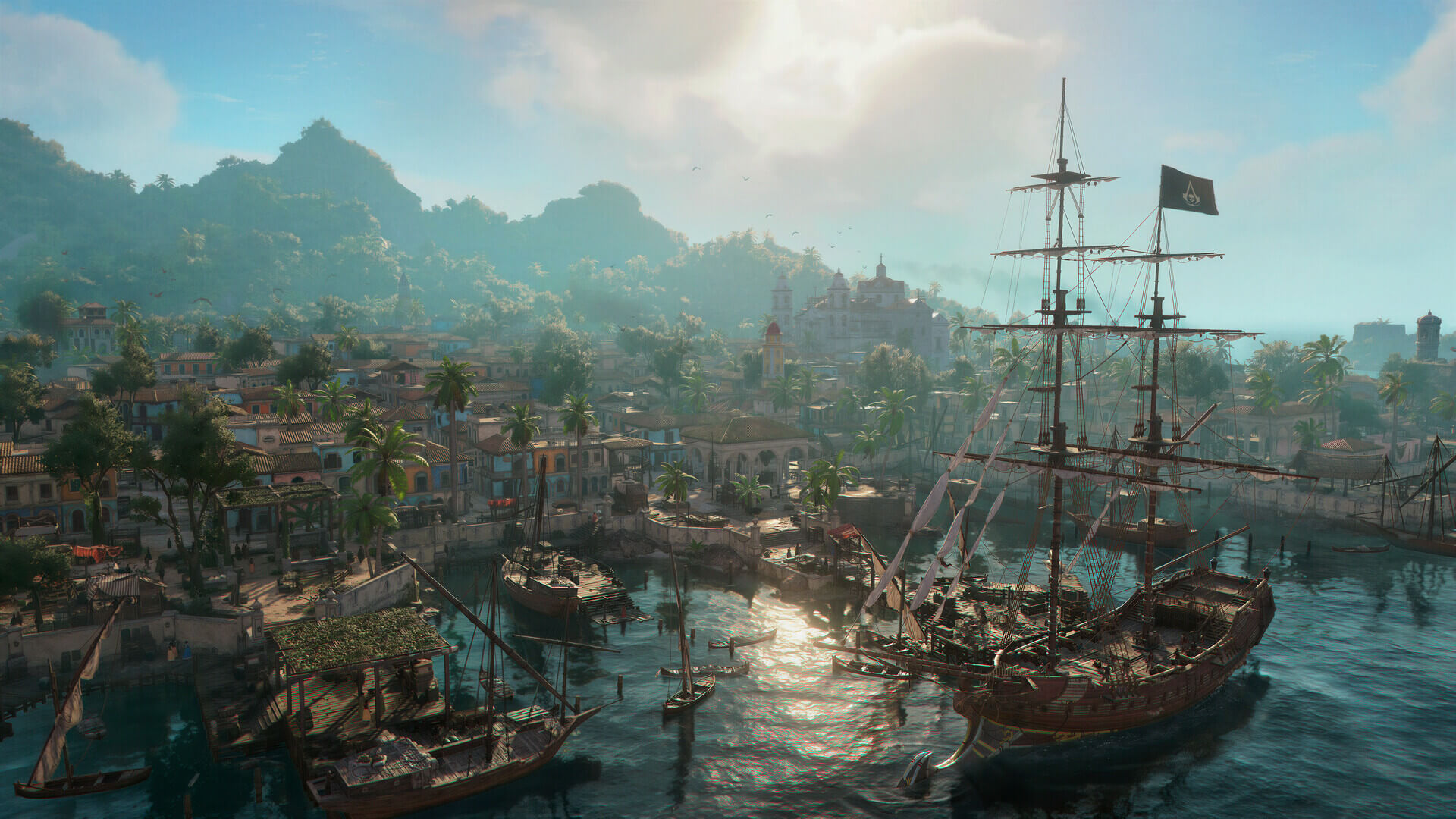 A panning shot of the Jackdaw docked at a harbour. A small port town spans out into the wilderness, before giving way to a small mountain range.
