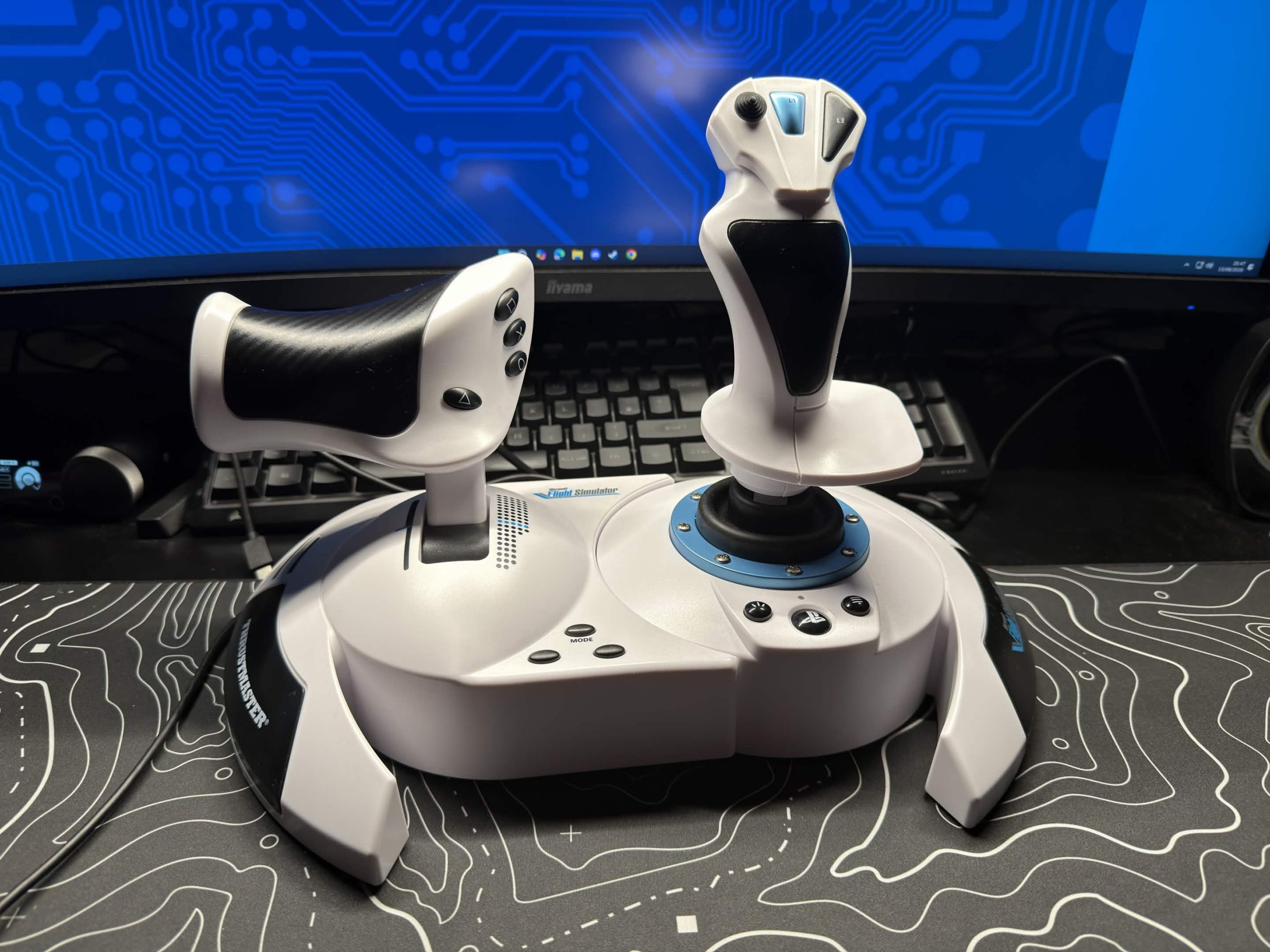 T Flight Hotas 5 on the desk in front of a monitor