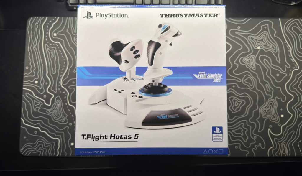 the t flight hotas 5 box on a desk