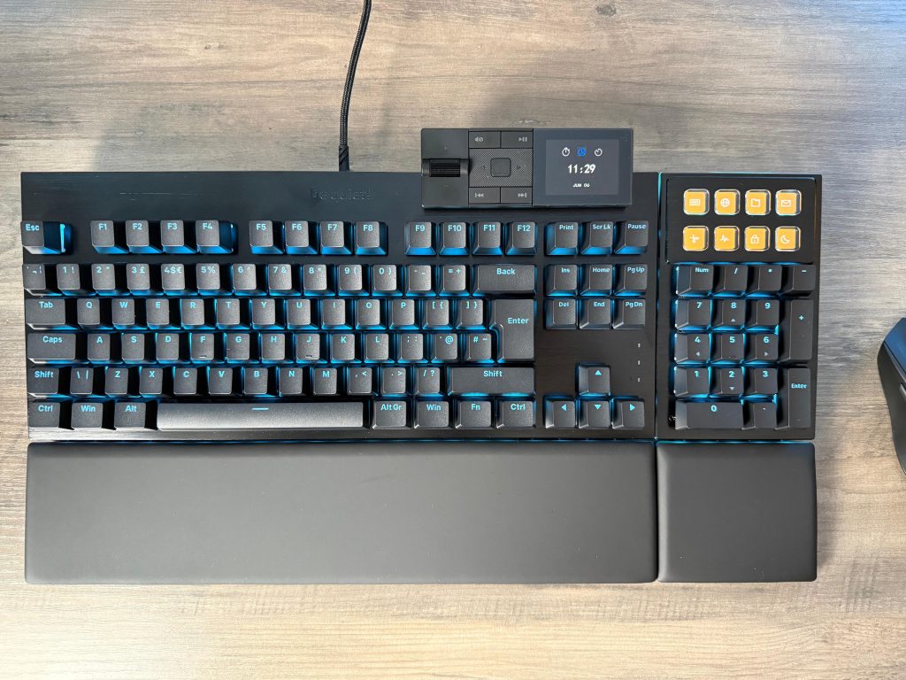 A bequiet! Dark Mount keyboard paired with a mouse, elegantly placed on a desk, perfect for a gaming or work setup.