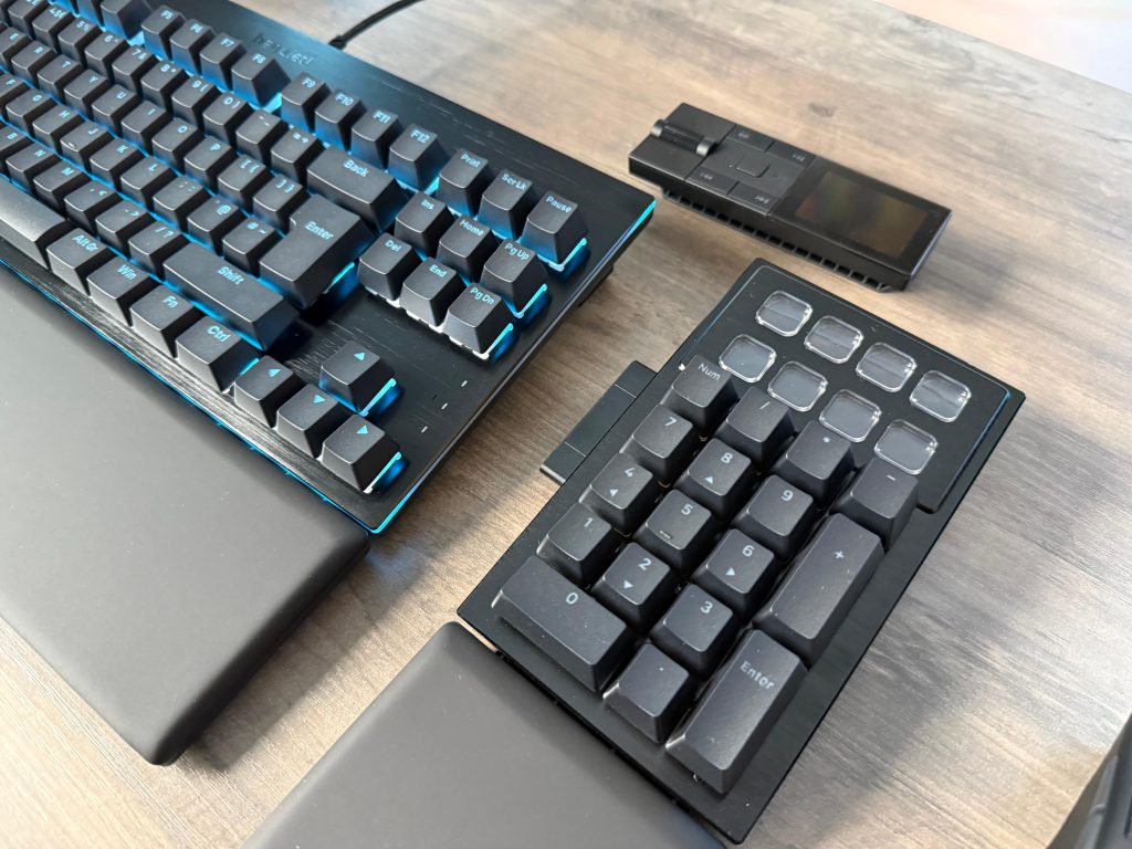 A bequiet! Dark Mount modular keyboard and mouse displayed on a desk, highlighting a clean and functional workspace design.