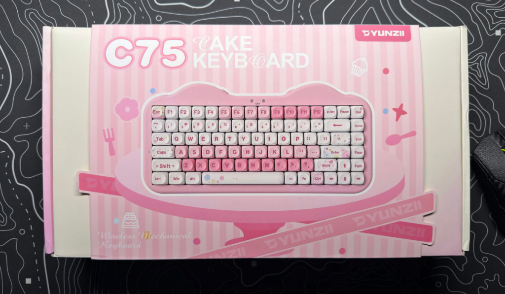cute yunzii c75 cake meow keyboard on a desk