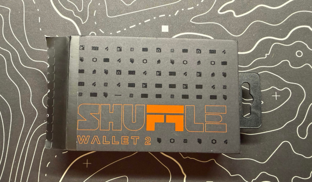 the shuffle wallet 2.0 box on the desk