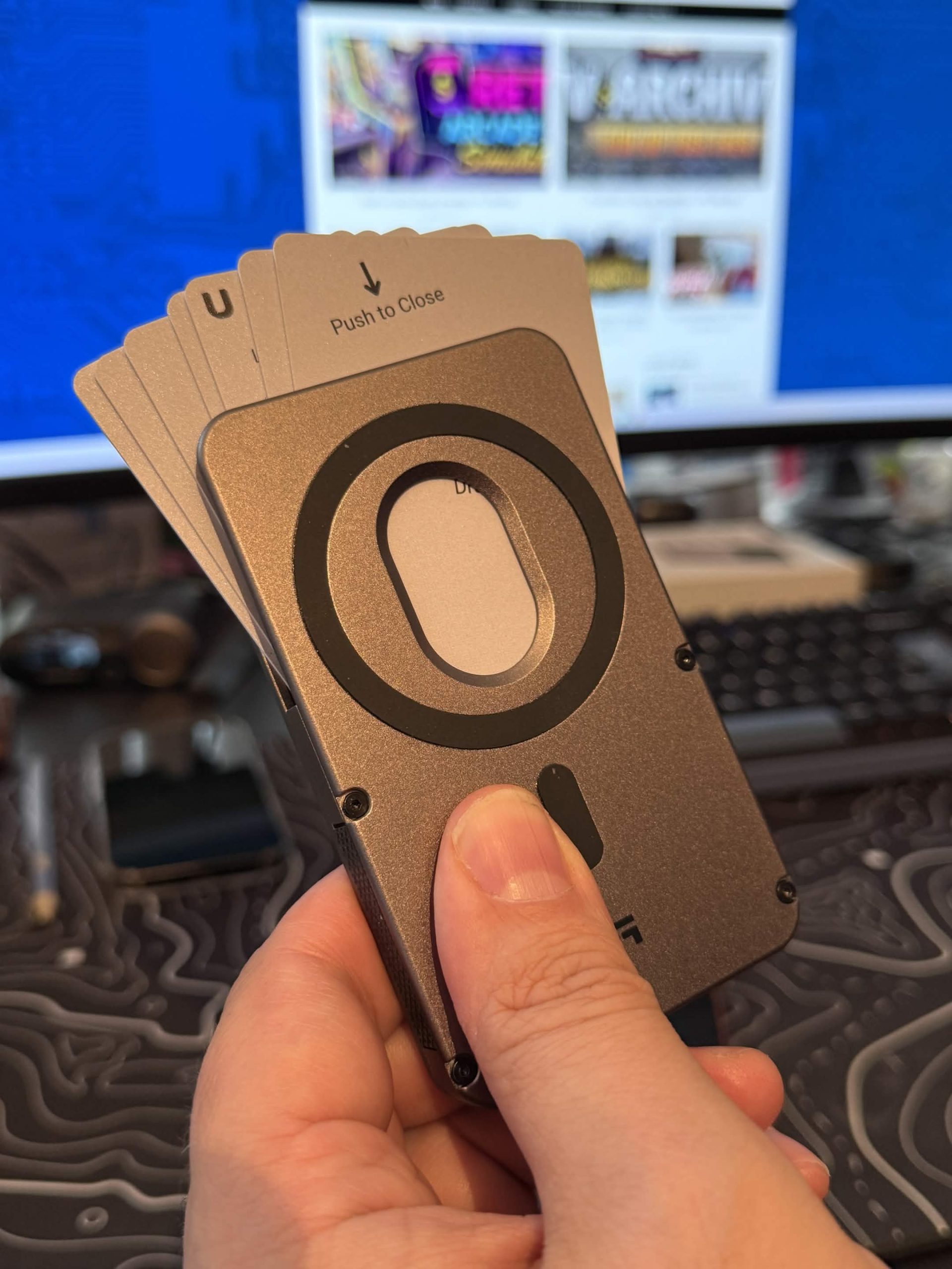 image of the shuffle wallet 2.0 with the cards fanned out