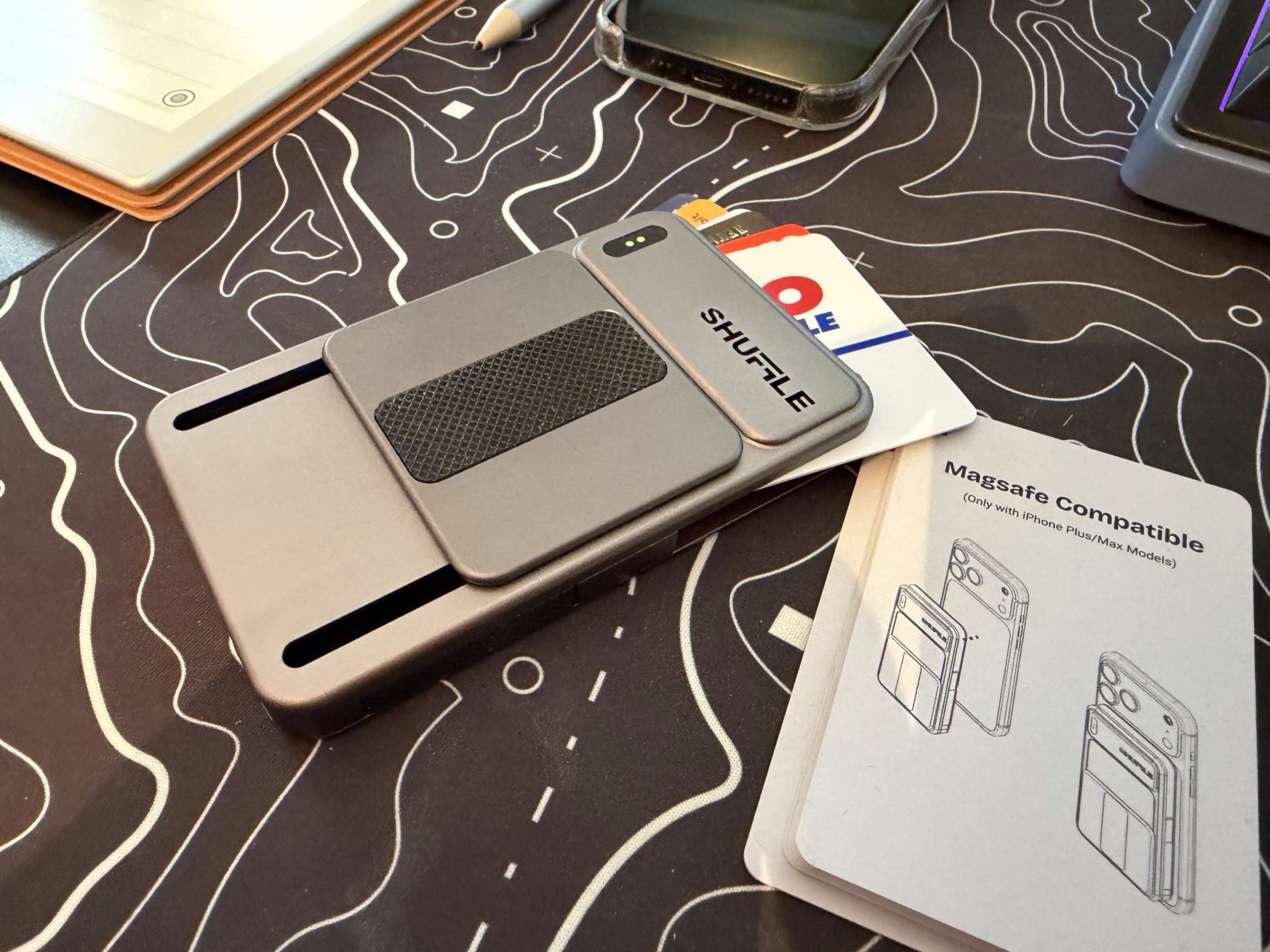 image of the shuffle wallet on the desk in quick reach for all needs