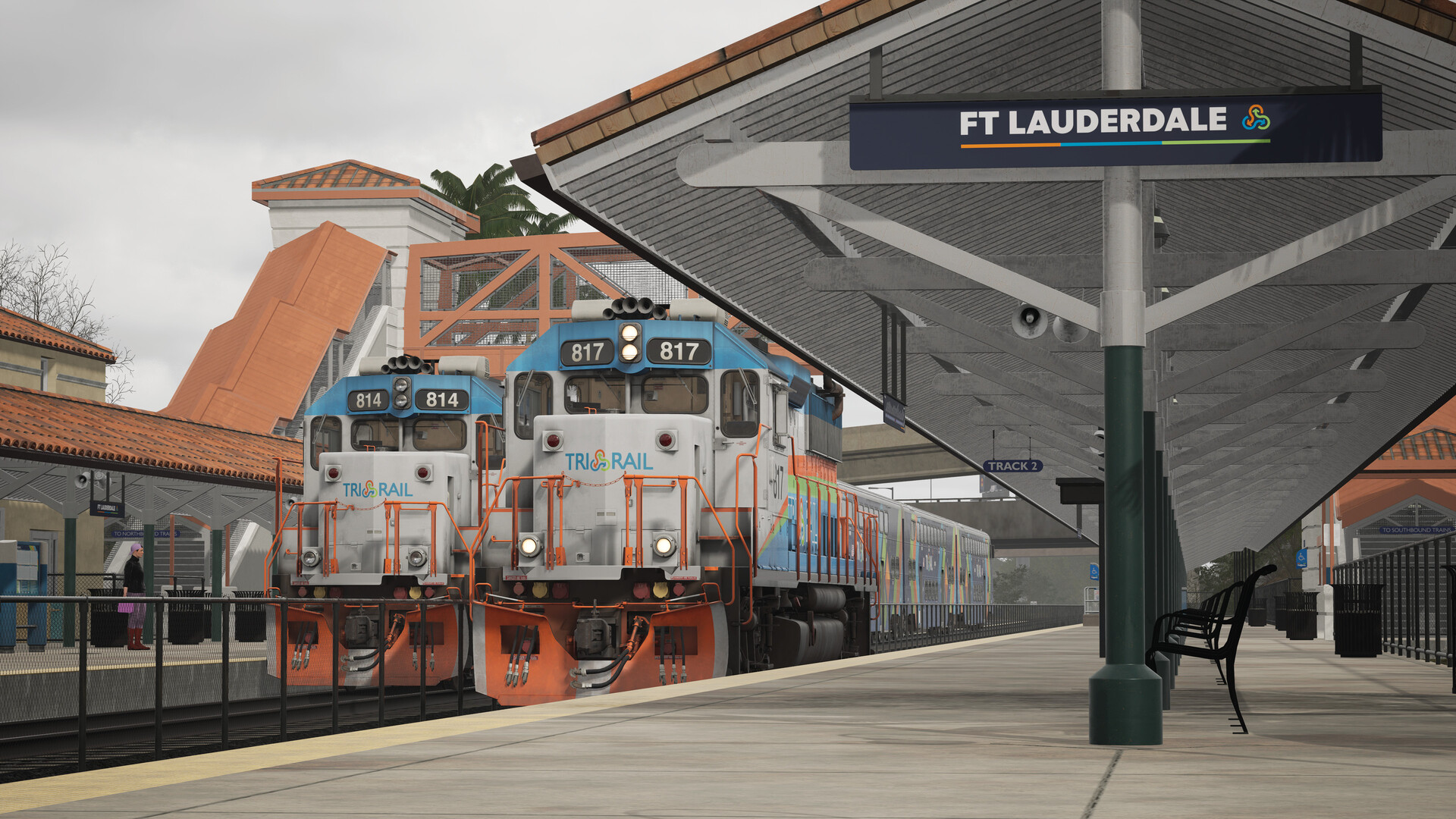 Two heavy locomotives at the Fort Lauderdale train station.