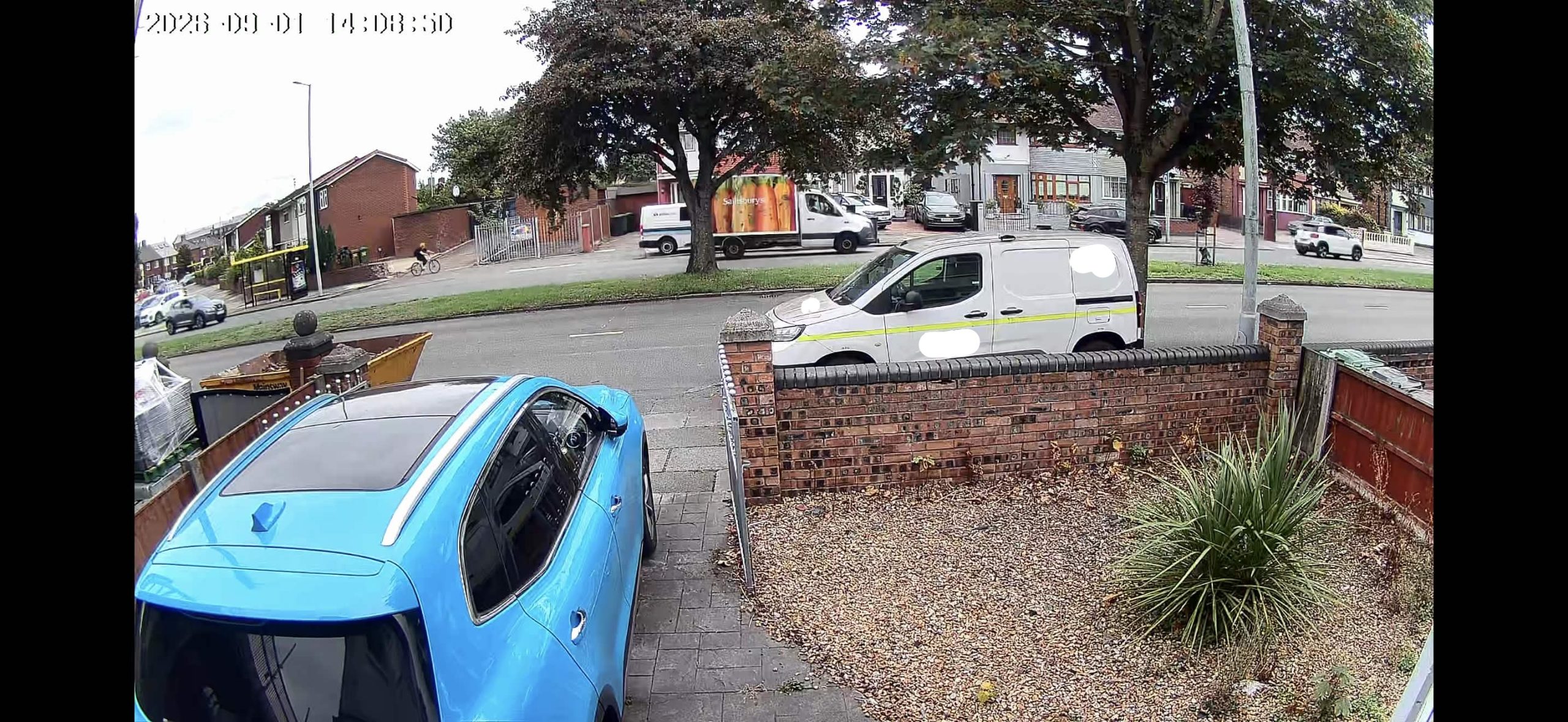 image taken from the camera showing a road and vehicles