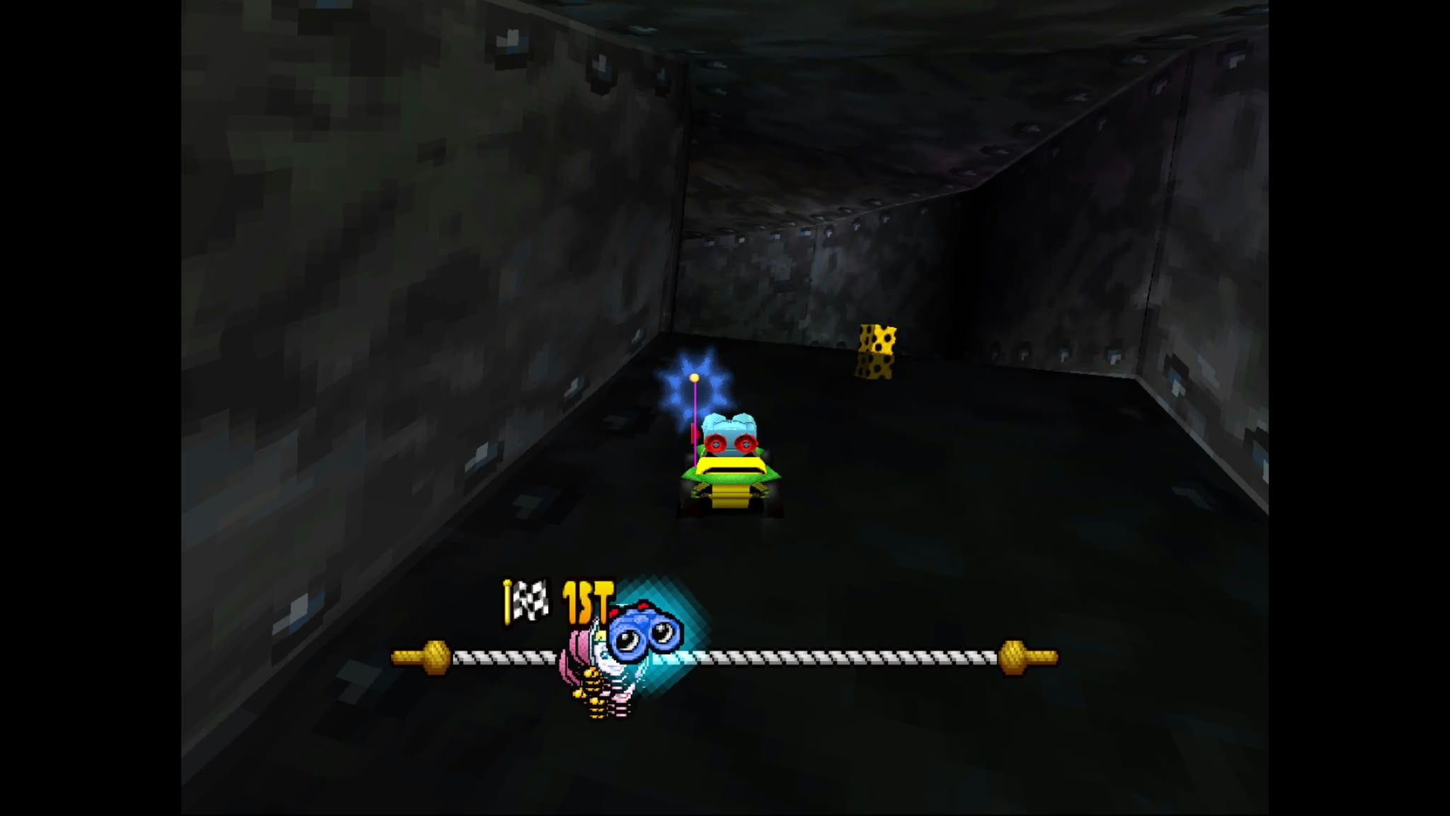 Toy Story Racer screenshot showing a colorful kart in a dark tunnel, with a yellow power up box ahead and a “1st” position indicator alongside a graphic of the character Lenny.