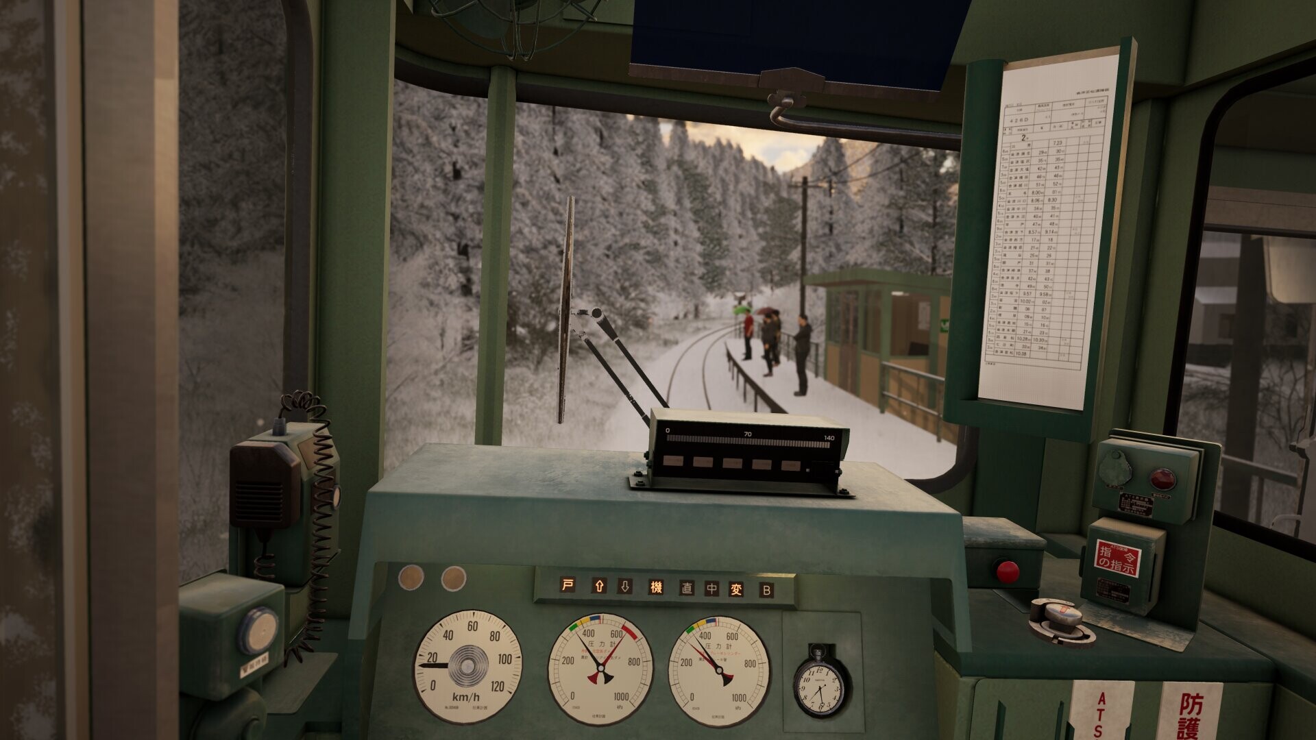 Inside the driver cabin of the KiHa 40 locomotive. Outside it is heavily snowing.