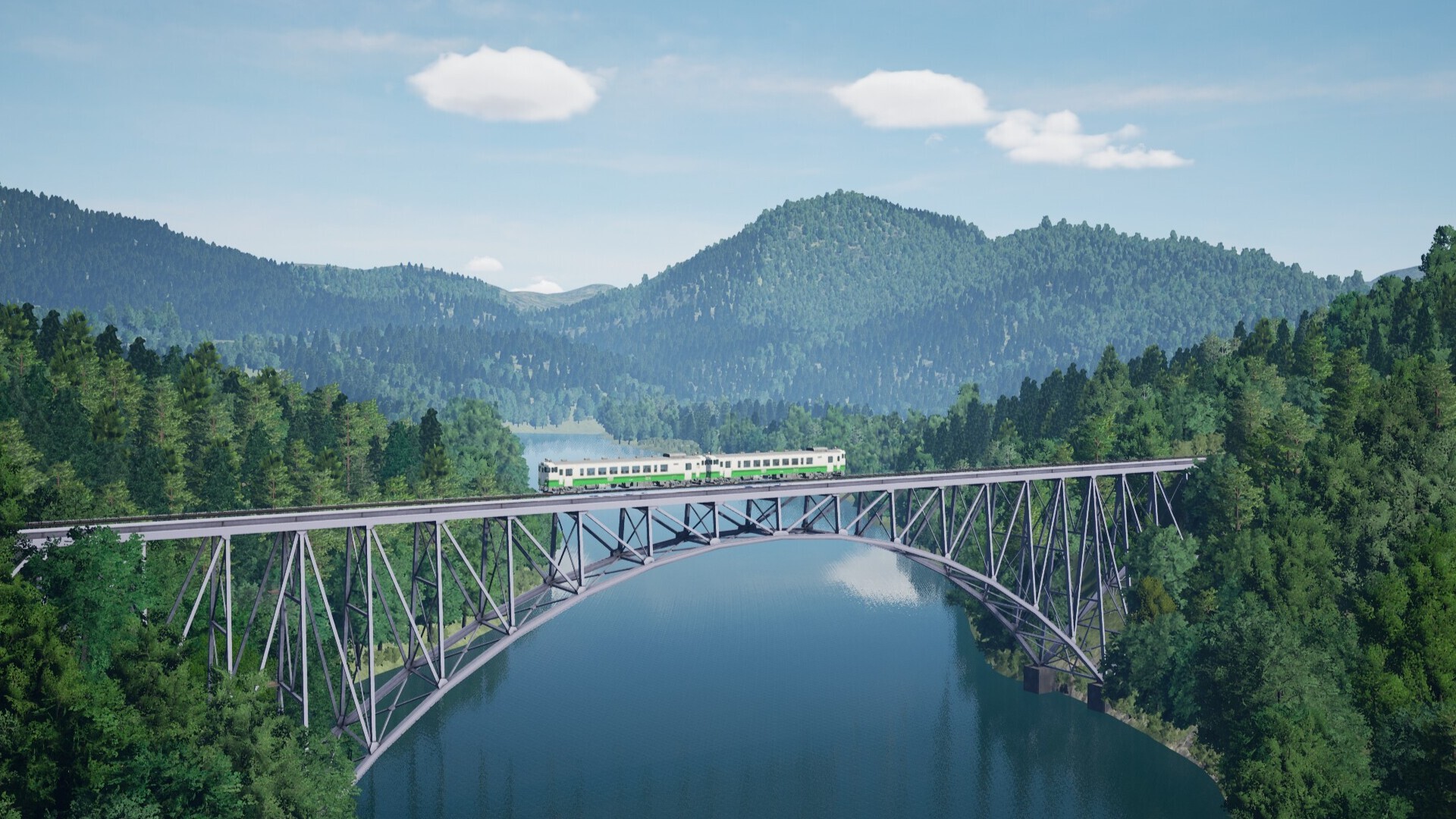 The KiHa 40 crossing a long bridge over a velly.